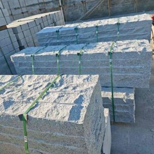 崇左芝麻白自然面整石 坐凳