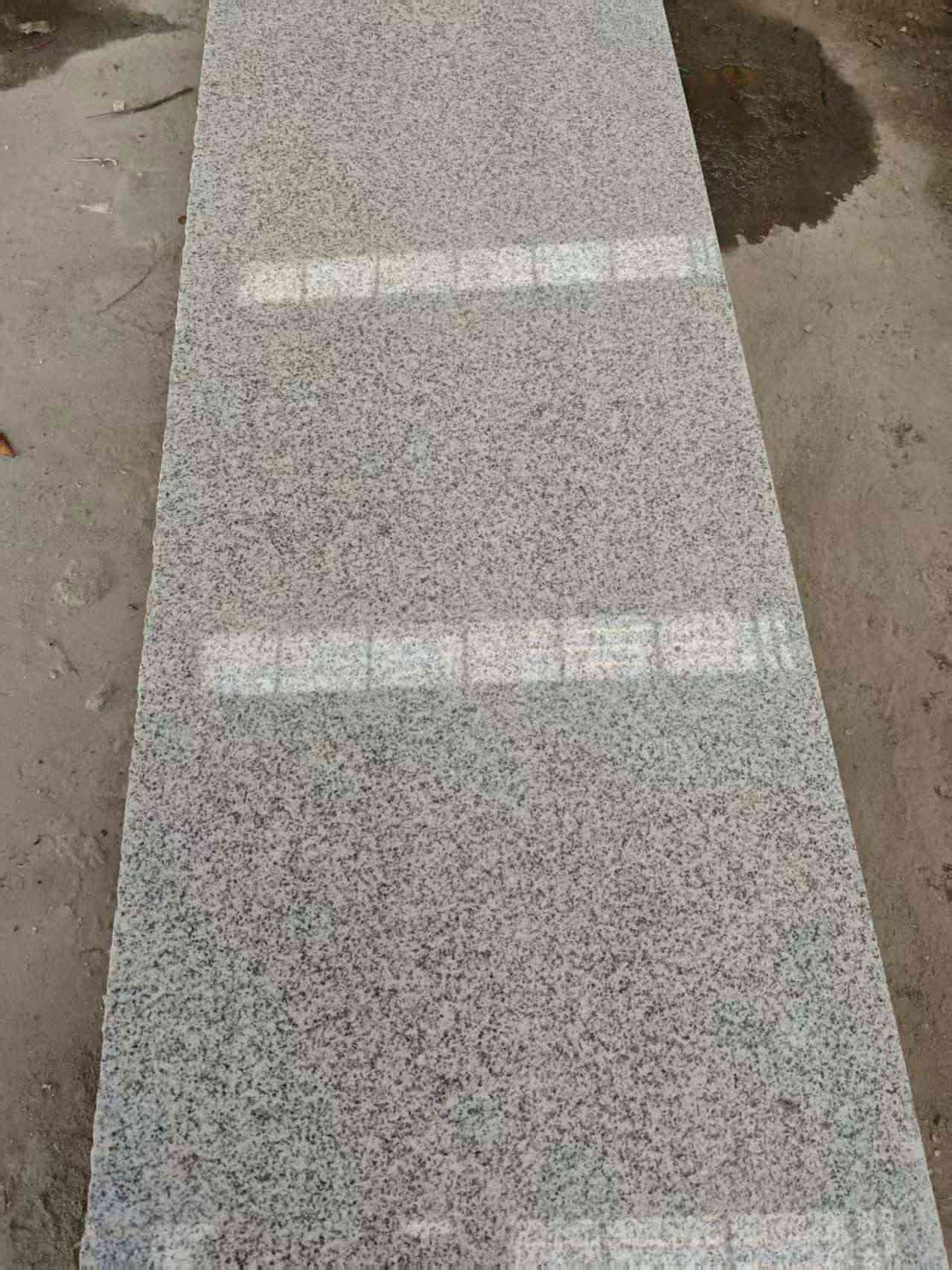 崇左芝麻白光面毛板